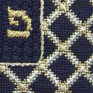 Detail of the letter "phey" and some of the border and trellis.